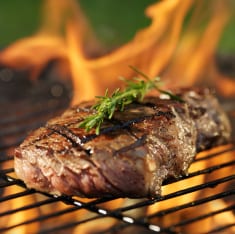 stock-photo-47954946-steak-cooking-over-flaming-grill - Copy